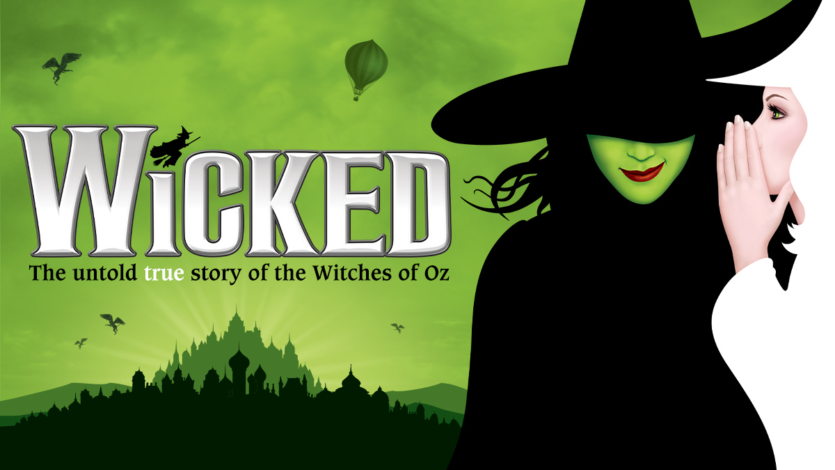 'Wicked' title in white all caps over a green background with the emerald city skyline. Image to the right is Galinda whispering into Elphaba's ear.