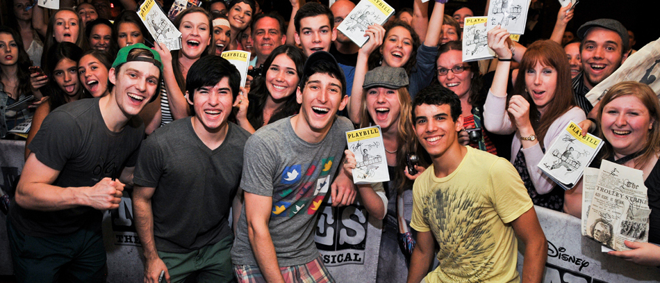 A crowd of fans at the stage door for Newsies on Broadway