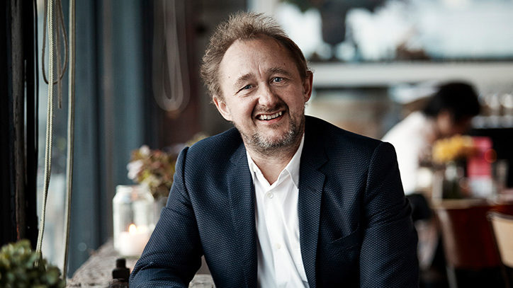 A photo of Andrew Upton in a restaurant