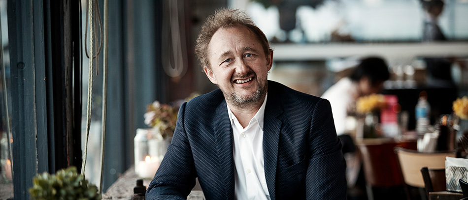 A photo of Andrew Upton in a restaurant