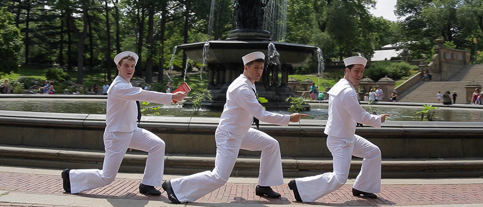 The stars of Broadway's On The Town dancing in Central Park in front of Bethesda Fountain