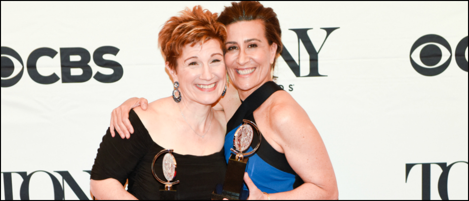 Lisa Kron and Jeanine Tesori hold their Tony Awards for their musical Fun Home