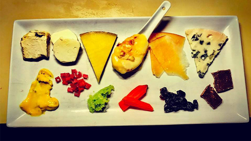 A delicious cheese, jam and fruit plate put together by the fromage experts at Casellula–consider your Broadway date night made.