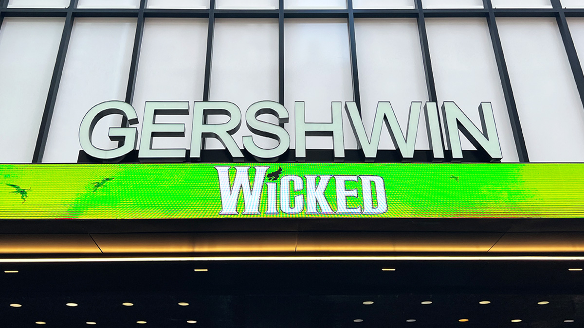Gershwin Theatre Marquee shows the current show 'Wicked' in white all caps on a green LED background with 'Gershwin' written above in white LED all caps.