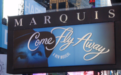 Marquis Theatre marquee, featuring Come Fly Away on Broadway