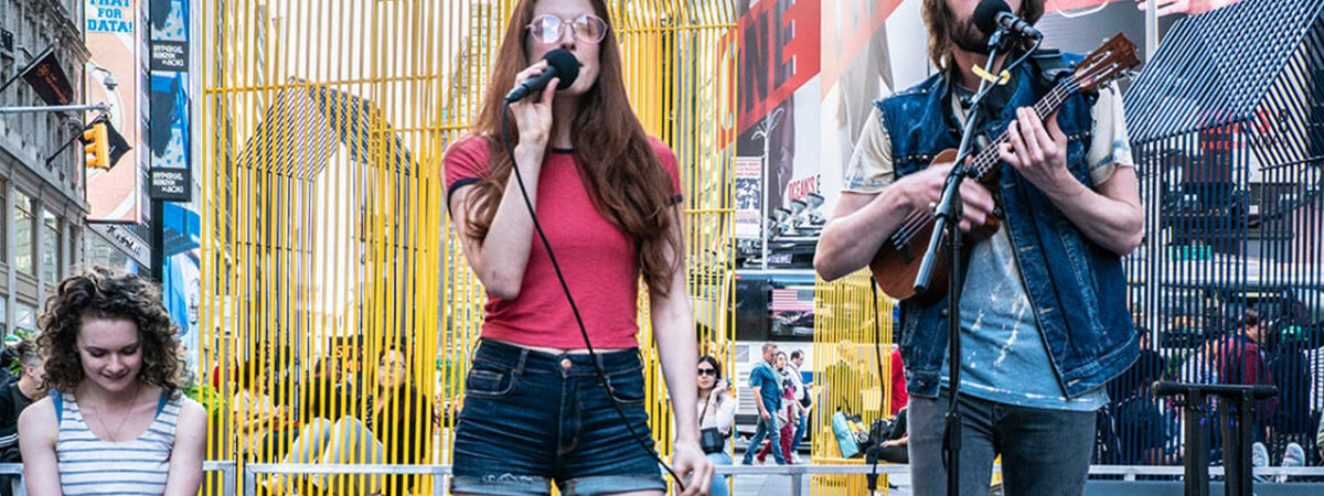 Broadway Buskers performing songs in Times Square