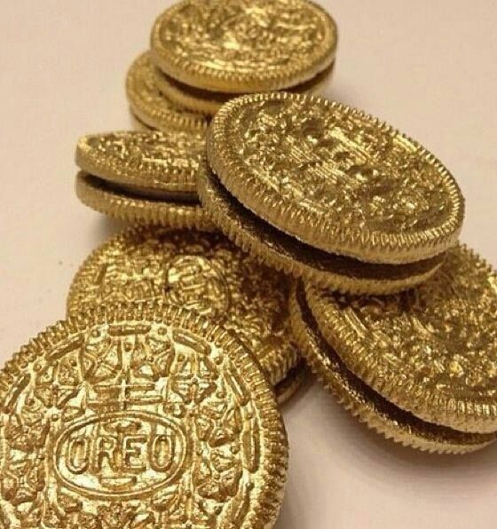 Oreos spray painted with edible gold food dye.