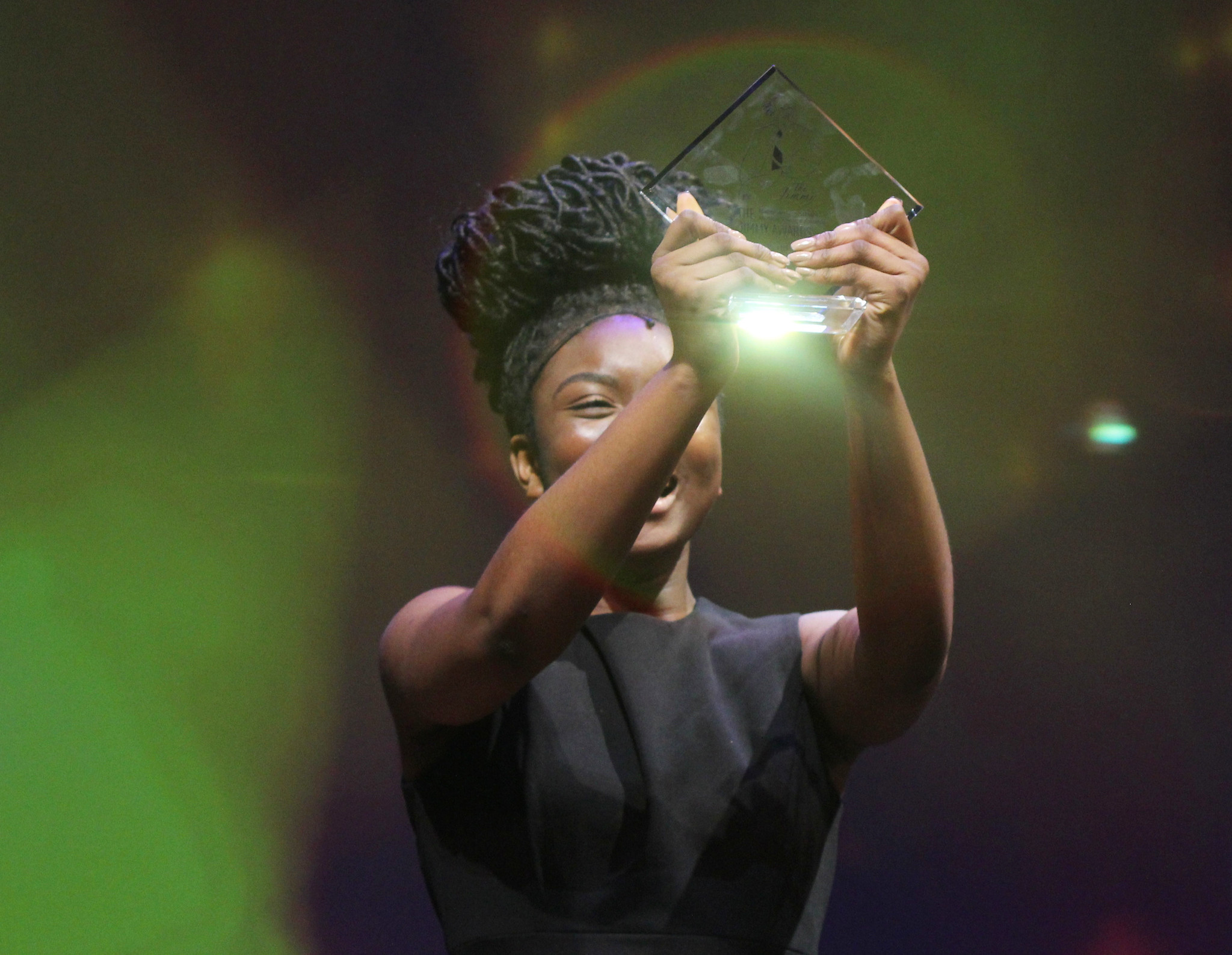 Ekele Ukegbu accepting her Jimmy Award. Photo by Henry McGee/NHSMTA