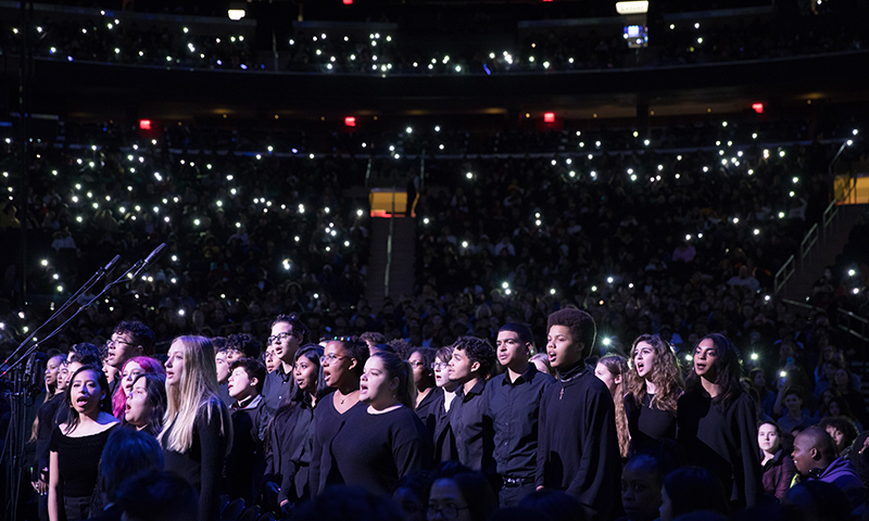 A New York City school choir performs at <i>To Kill a Mockingbird</i> at Madison Square Garden. Photo by Julieta Cervantes.