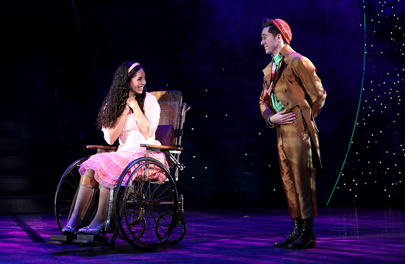 Mili Diaz as Nessarose and Michael Wartella as Boq in WICKED. Photo by Joan Marcus.
