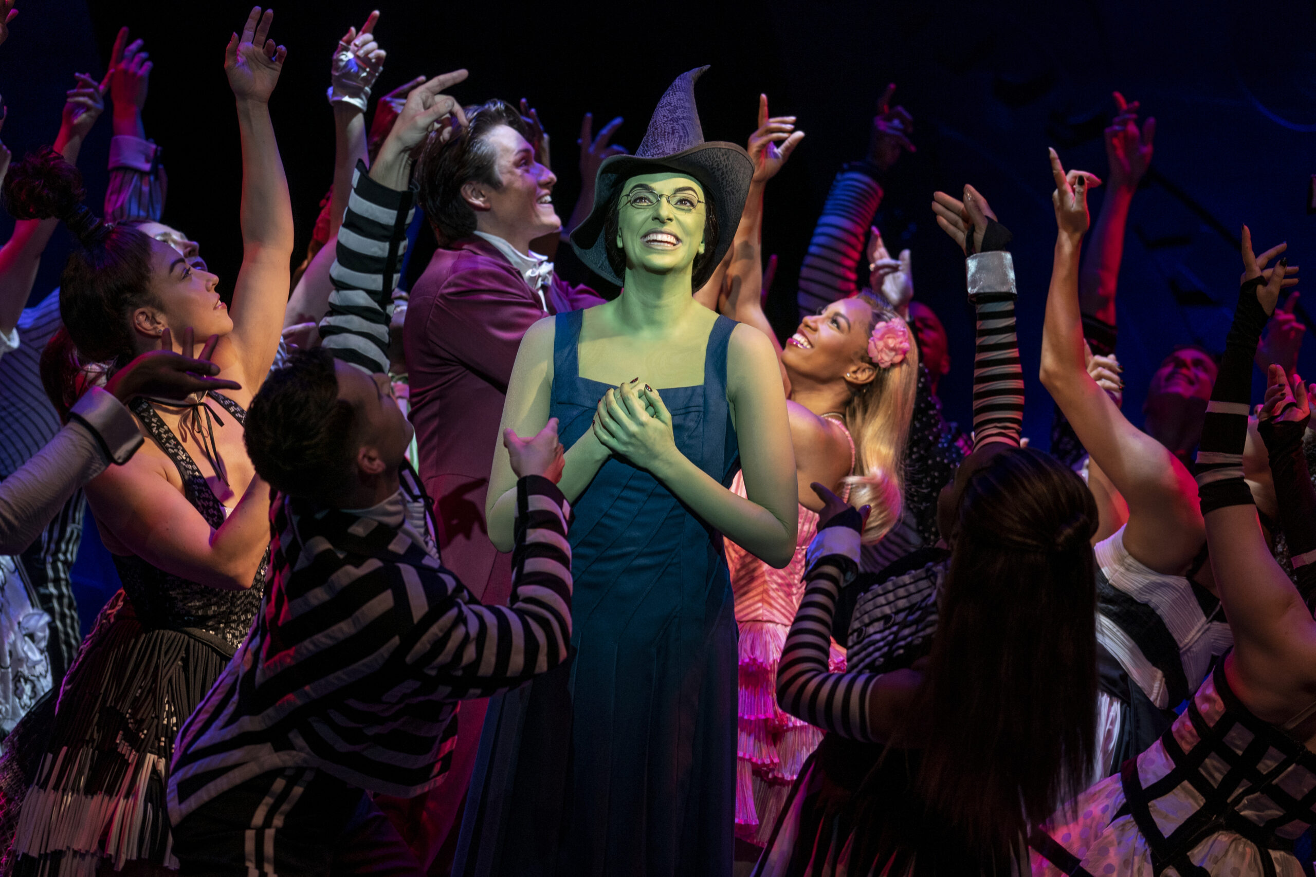 Talia Suskauer and the Cast of Wicked. Photo by Joan Marcus.