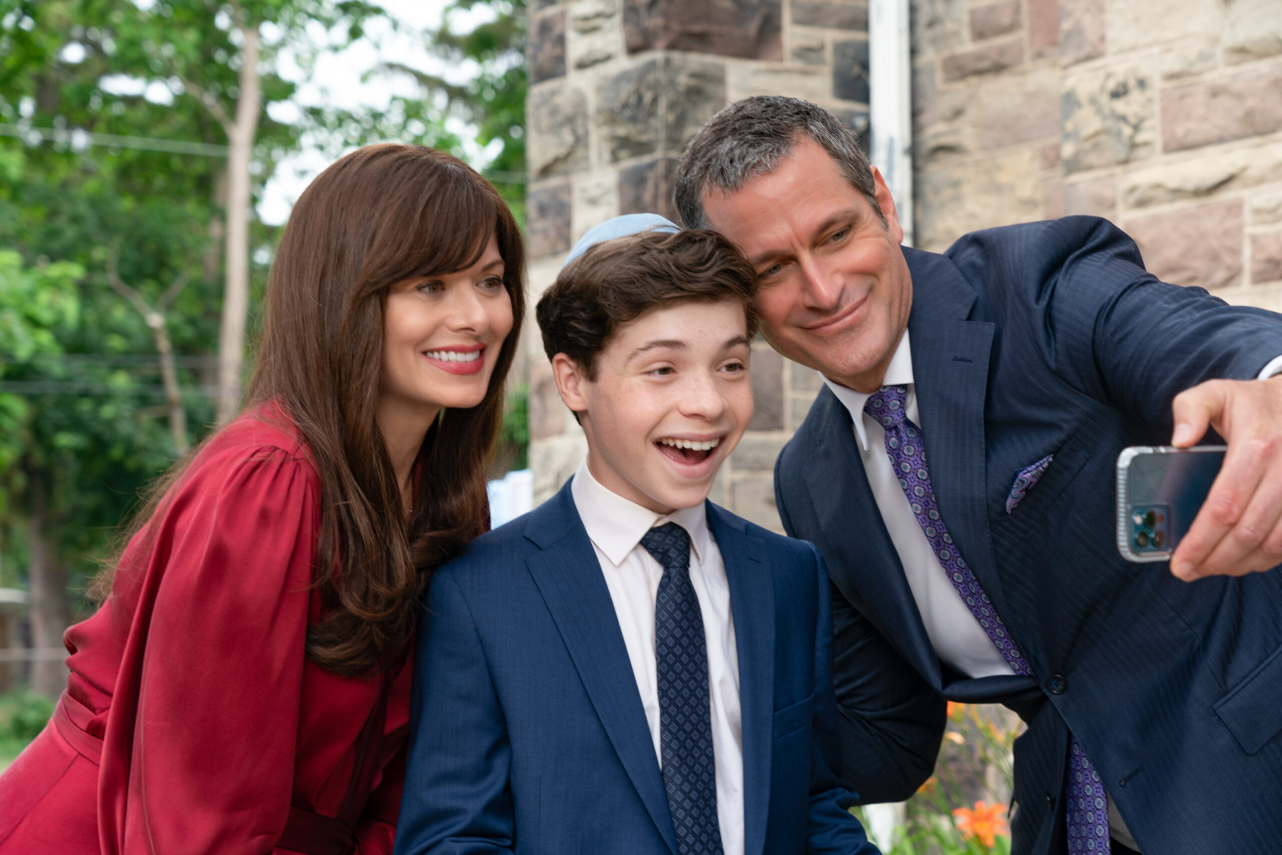 Debra Messing as Jessica, Eli Golden as Evan, Peter Hermann as Joel in <i>13 The Musical</i>. Photo courtesy of Alan Markfield for Netflix.