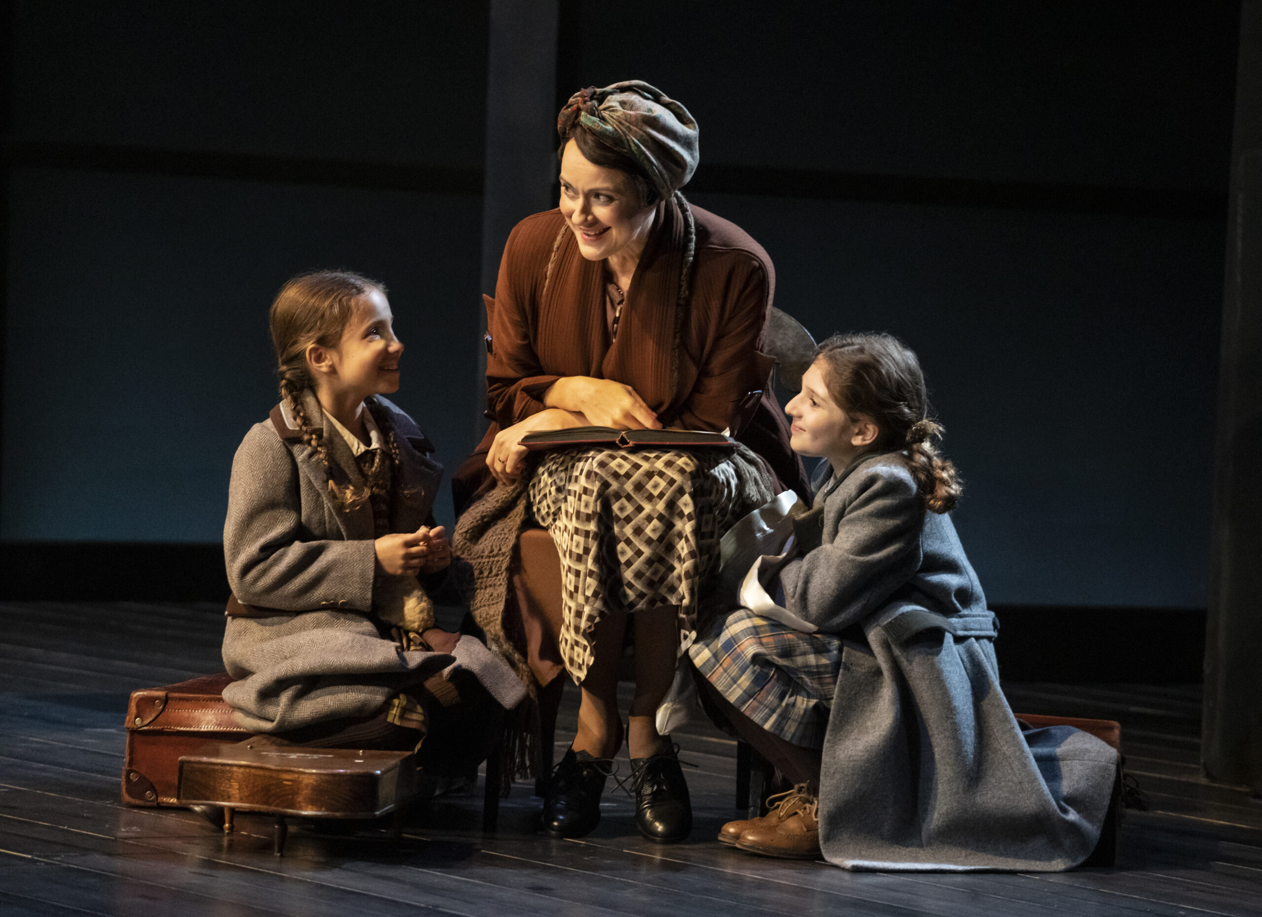 Reese Bogin, Sara Topham, and Ava Michele Hyl in Leopoldstadt. Photo by Joan Marcus.