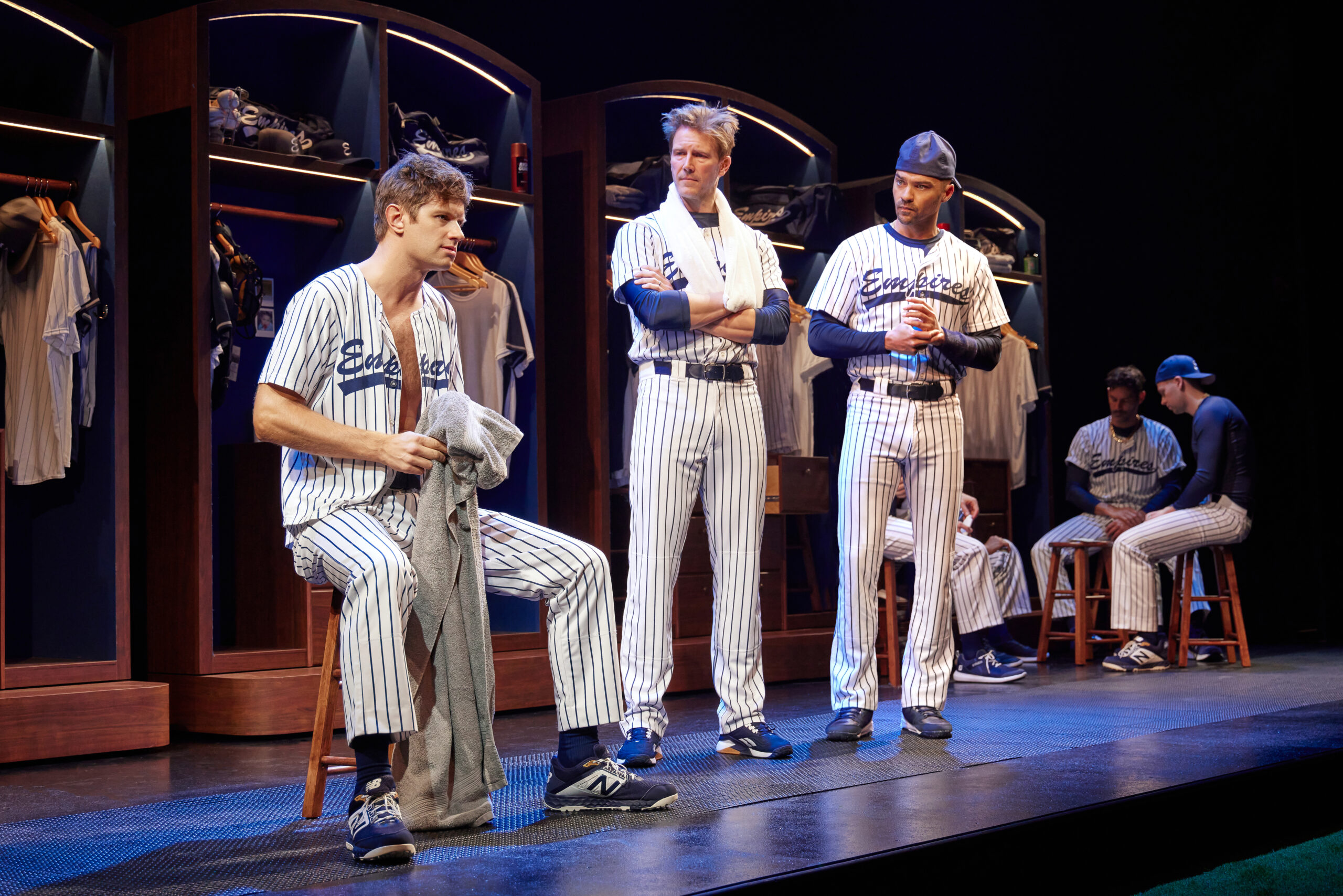 Michael Oberholtzer, Bill Heck, and Jesse Williams in <i>Take Me Out</i>. Photo by Jeremy Daniels.