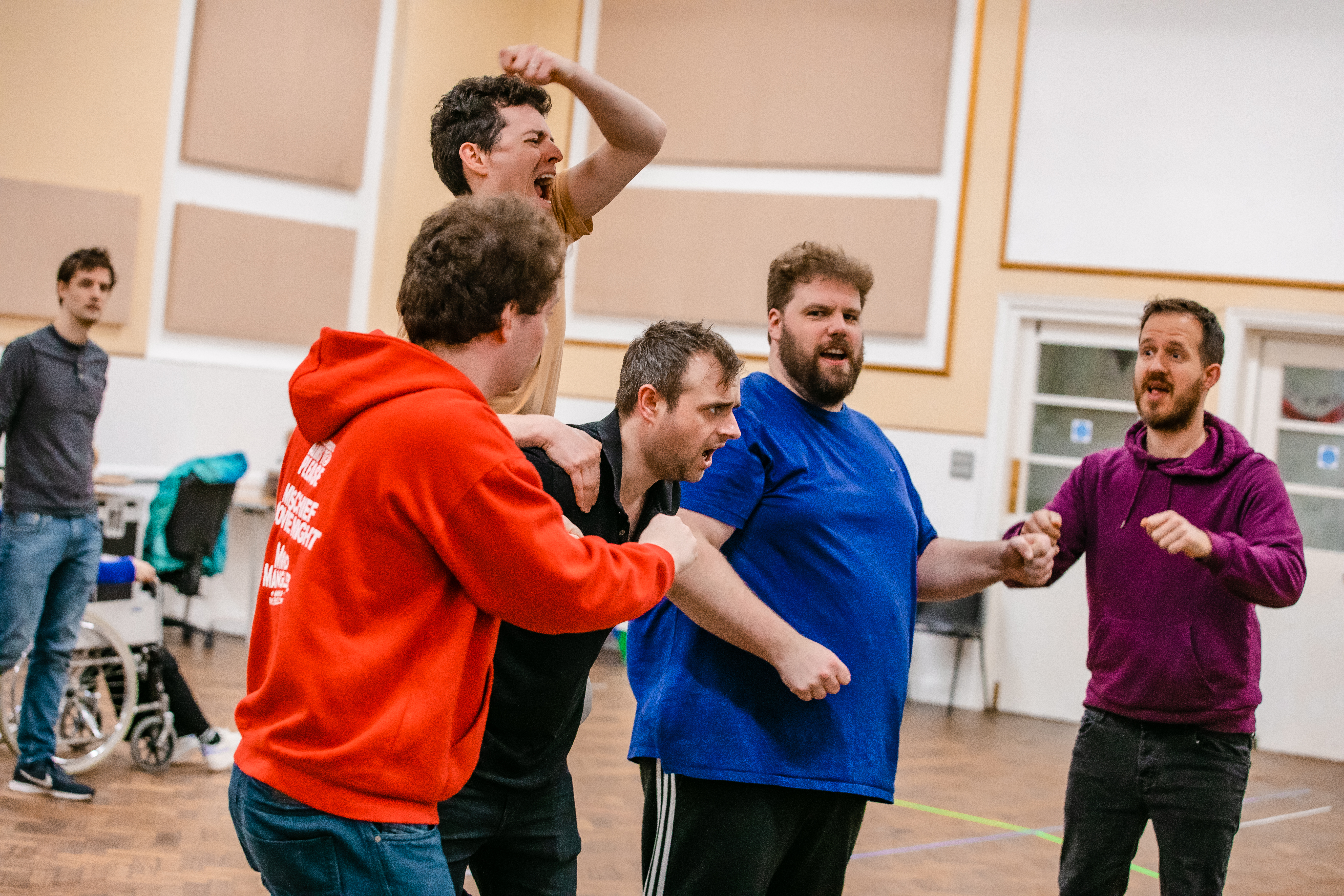Harry Kershaw, Jonathan Sayer, Chris Leask, Henry Lewis, and Fred Gray in rehearsals for Peter Pan Goes Wrong. Photo by Danny Kaan.