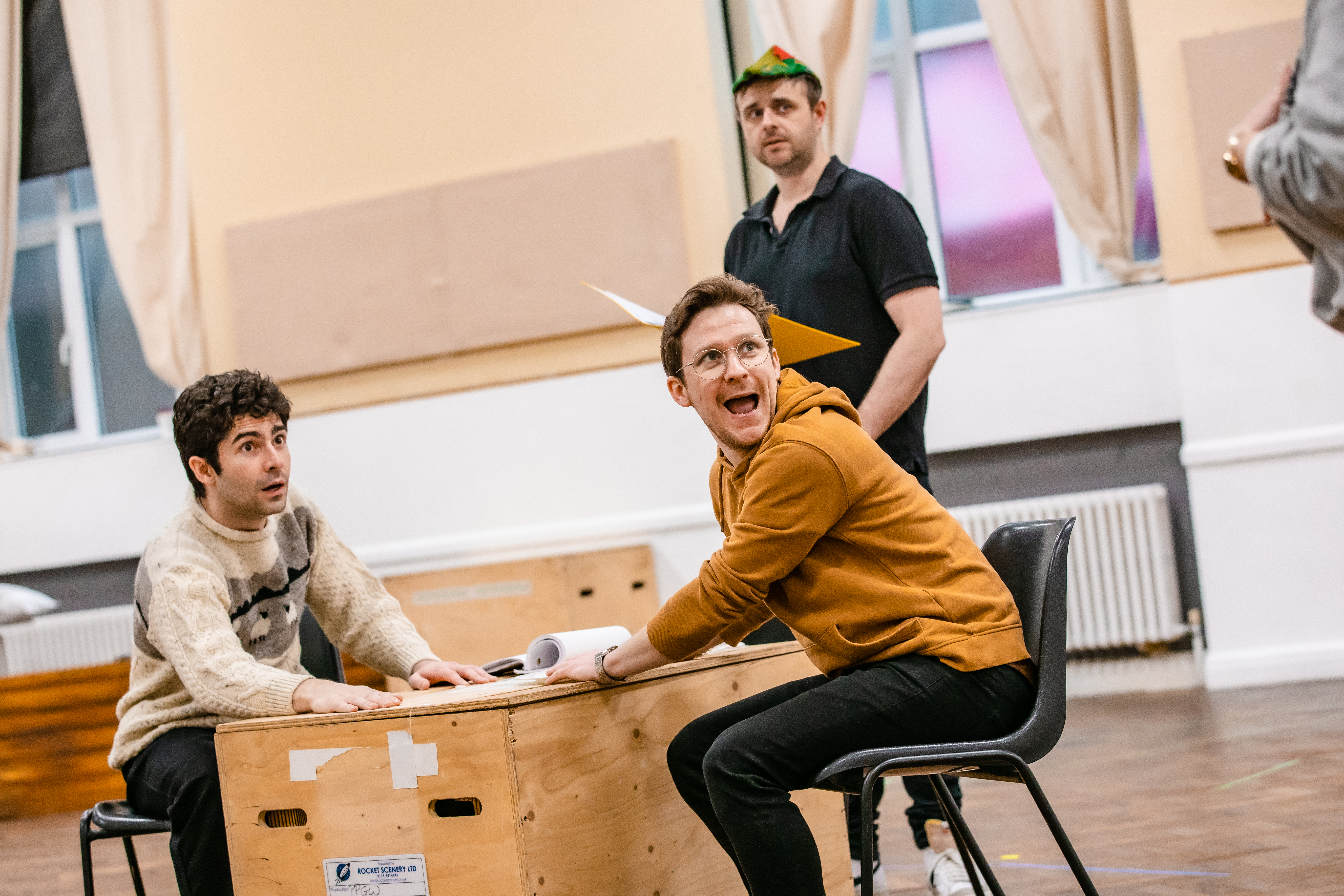 Bartley Booz, Matthew Cavendish, and Chris Leask in rehearsals for Peter Pan Goes Wrong. Photo by Danny Kaan.