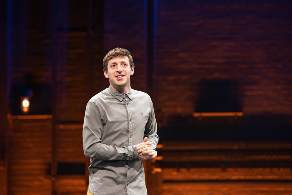 Alex Edelman in <i>Just For Us</i>. Photo by Matthew Murphy.