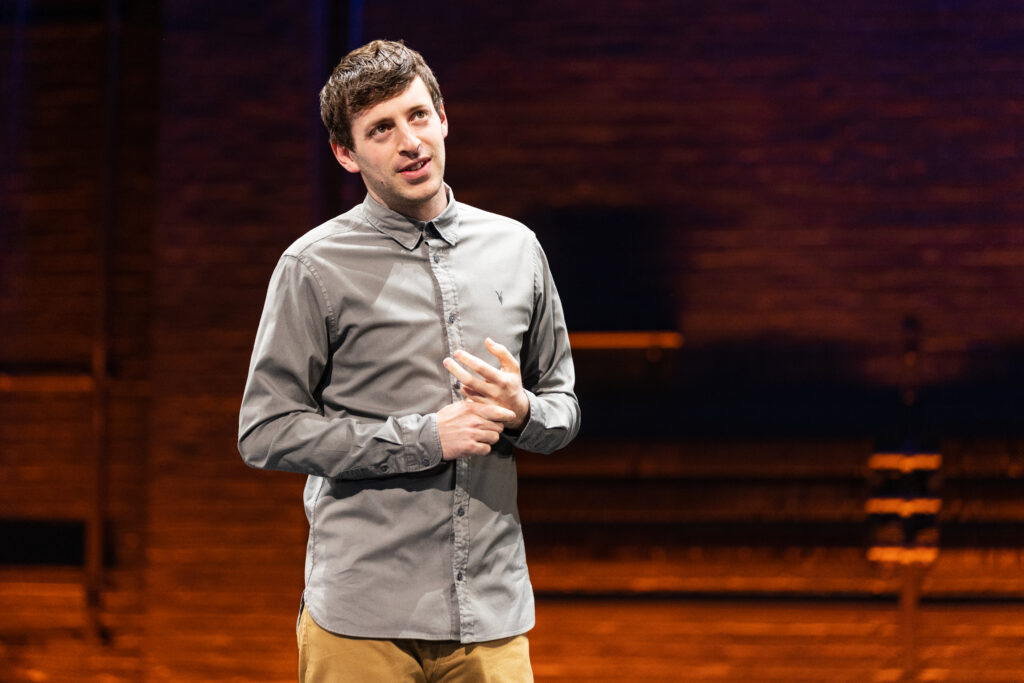 Alex Edelman in <i>Just For Us</i>. Photo by Matthew Murphy.