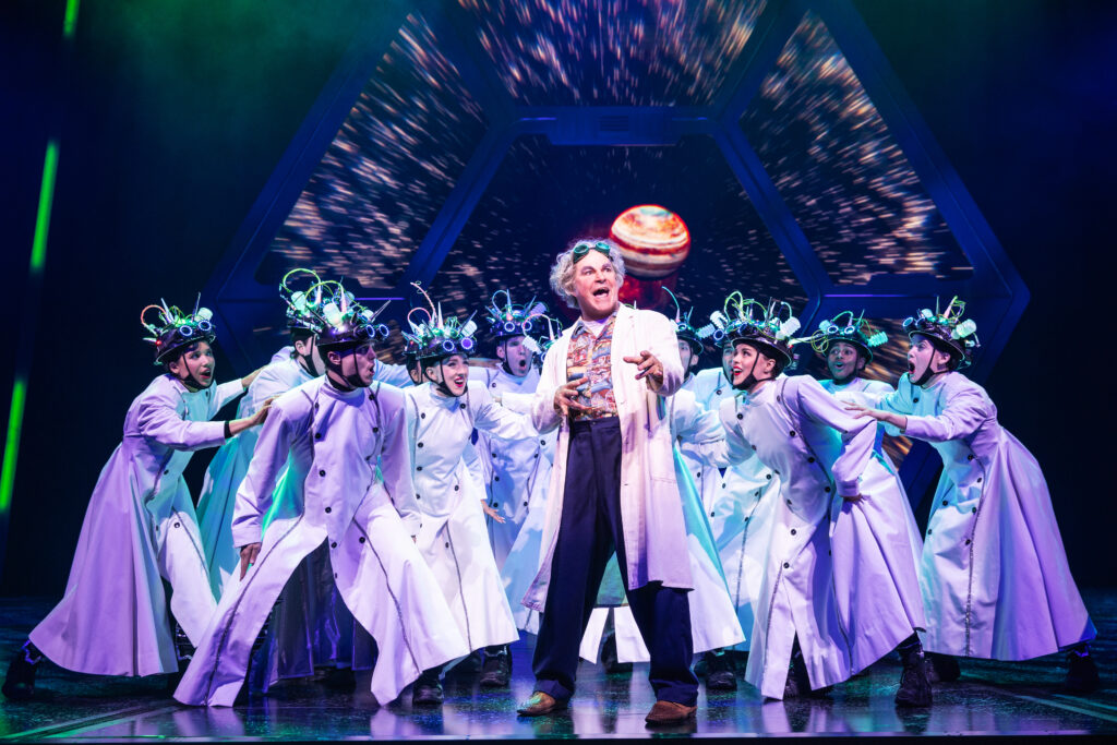 Roger Bart and the cast of Back to the Future: The Musical. Photo by Matthew Murphy and Evan Zimmerman.