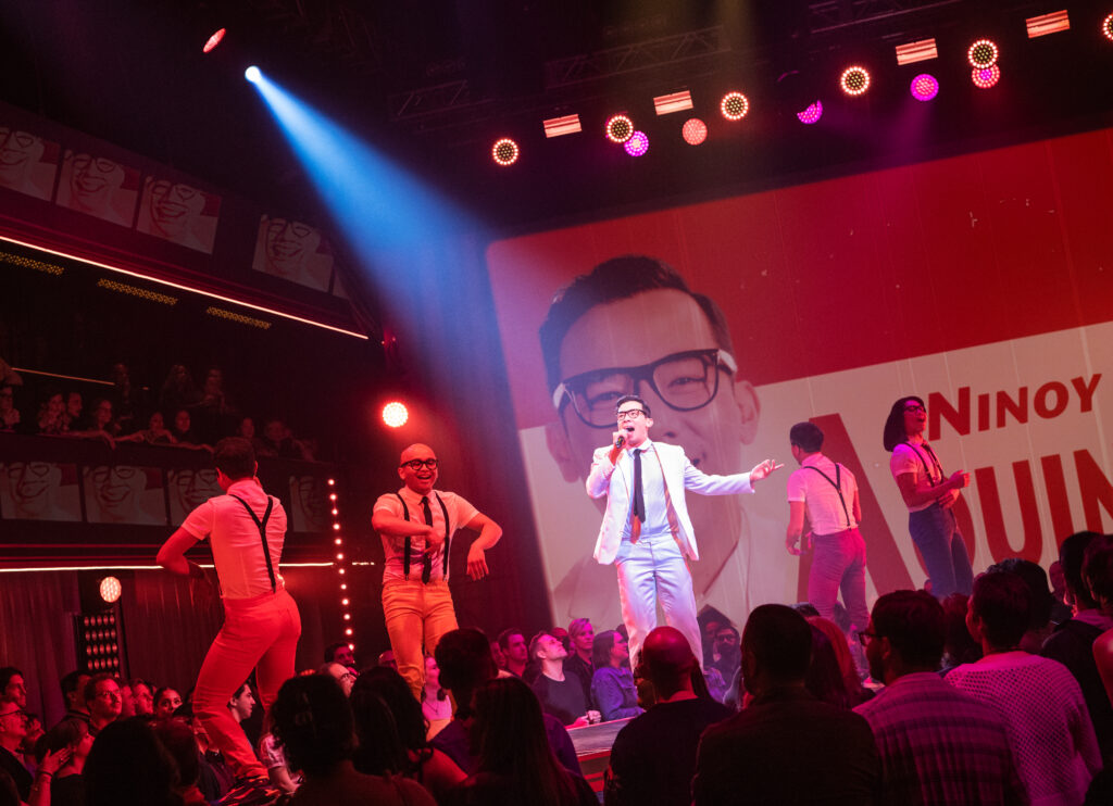 Conrad Ricamora and the cast of Here Lies Love. Photo by Billy Bustamante, Matthew Murphy, and Evan Zimmerman.