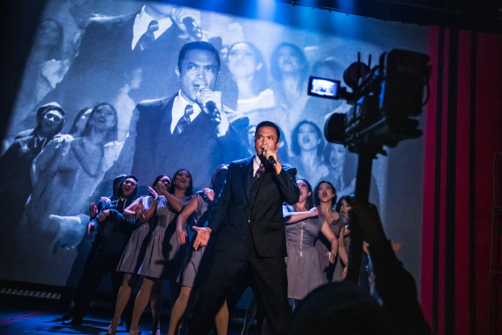 Jose Llana and the cast of Here Lies Love. Photo by Billy Bustamante, Matthew Murphy, and Evan Zimmerman.