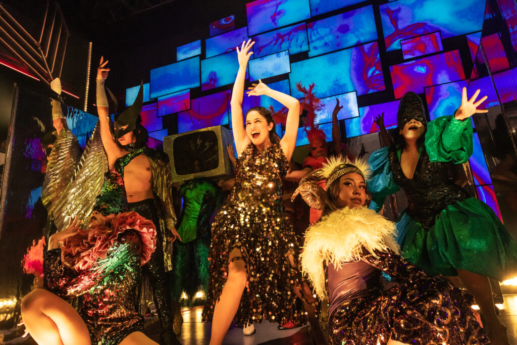 Arielle Jacobs and the cast of Here Lies Love. Photo by Billy Bustamante, Matthew Murphy, and Evan Zimmerman.