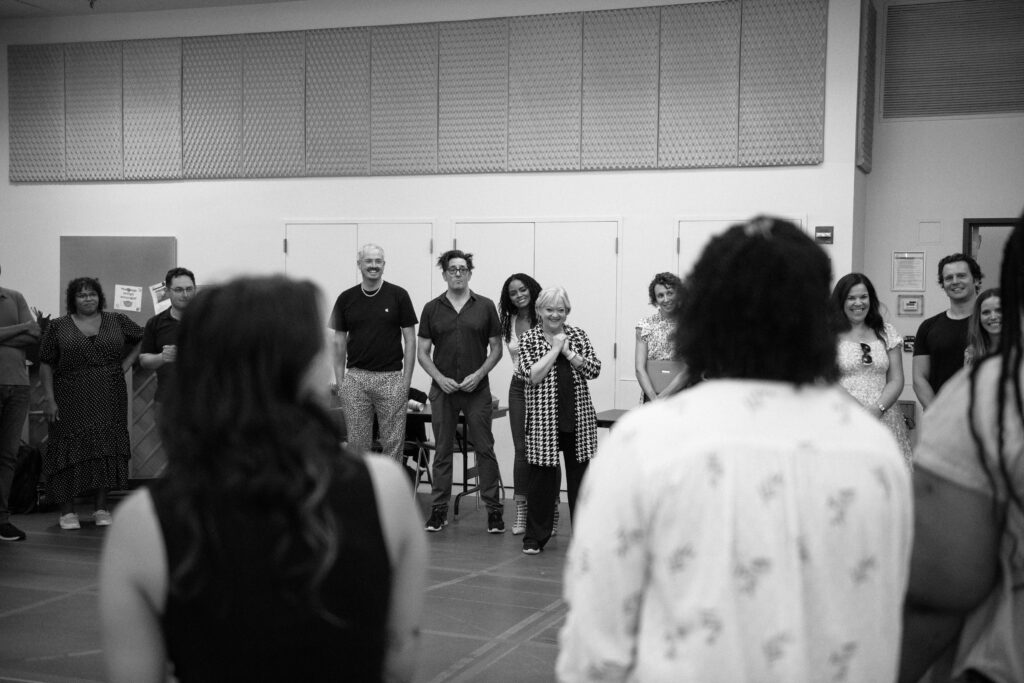 Choreographer Tim Jackson, Reg Rogers, Krystal Joy Brown, Director Maria Friedman, Lindsay Mendez, Jonathan Groff, Katie Rose Clarke, and the company of Merrily We Roll Along. Photo by Andy Henderson.