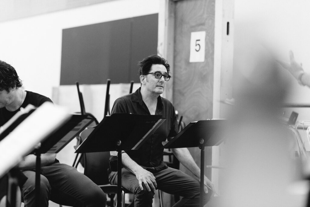 Reg Rogers in rehearsals for Merrily We Roll Along. Photo by Andy Henderson.