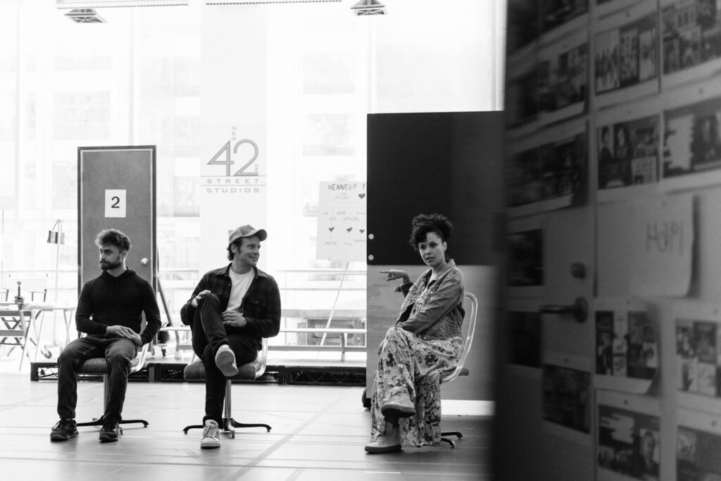 Daniel Radcliffe, Jonathan Groff, and Natalie Wachen in rehearsals for Merrily We Roll Along. Photo by Andy Henderson.