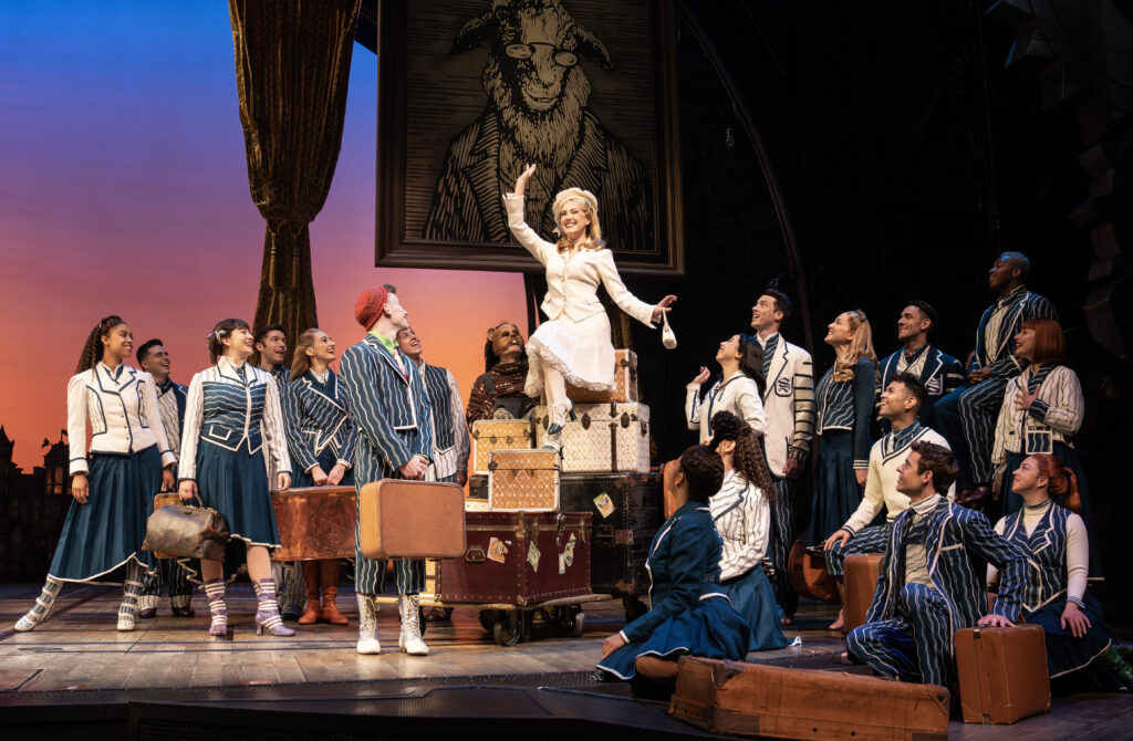 McKenzie Kurtz and the cast of Wicked. Photo by Joan Marcus.