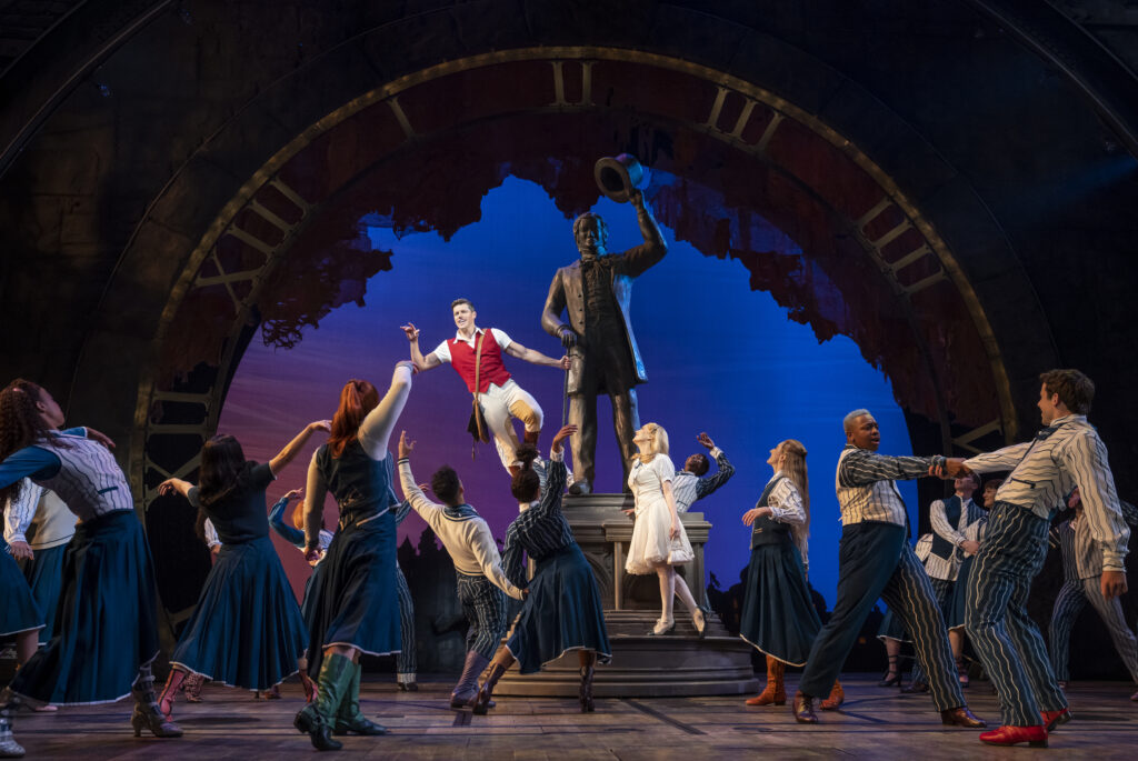 Jordan Litz, McKenzie Kurtz, and the cast of Wicked. Photo by Joan Marcus.