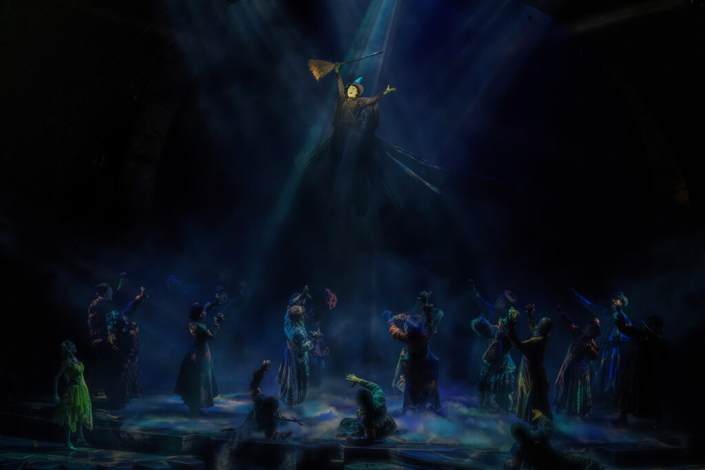 Alyssa Fox and the cast of Wicked. Photo by Joan Marcus.