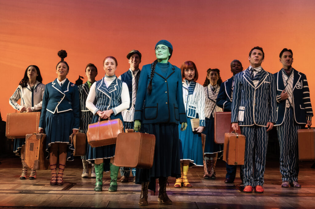 Alyssa Fox and the cast of Wicked. Photo by Joan Marcus.