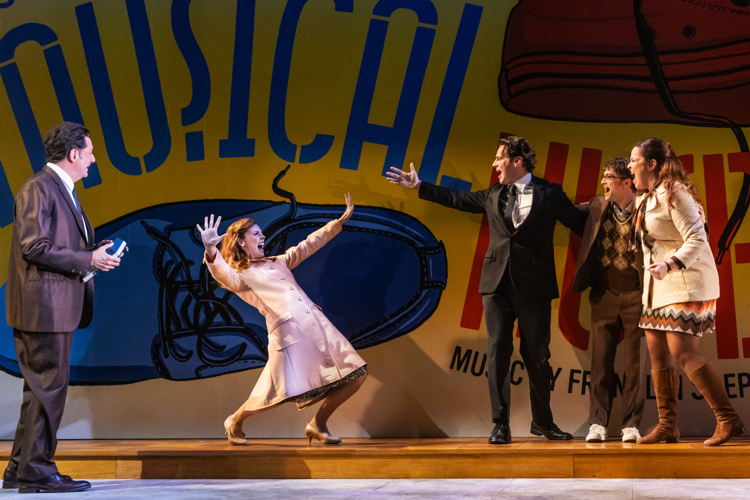 Reg Rogers, Katie Rose Clarke, Jonathan Groff, Daniel Radcliffe, and Lindsay Mendez in Merrily We Roll Along. Photo by Matthew Murphy.