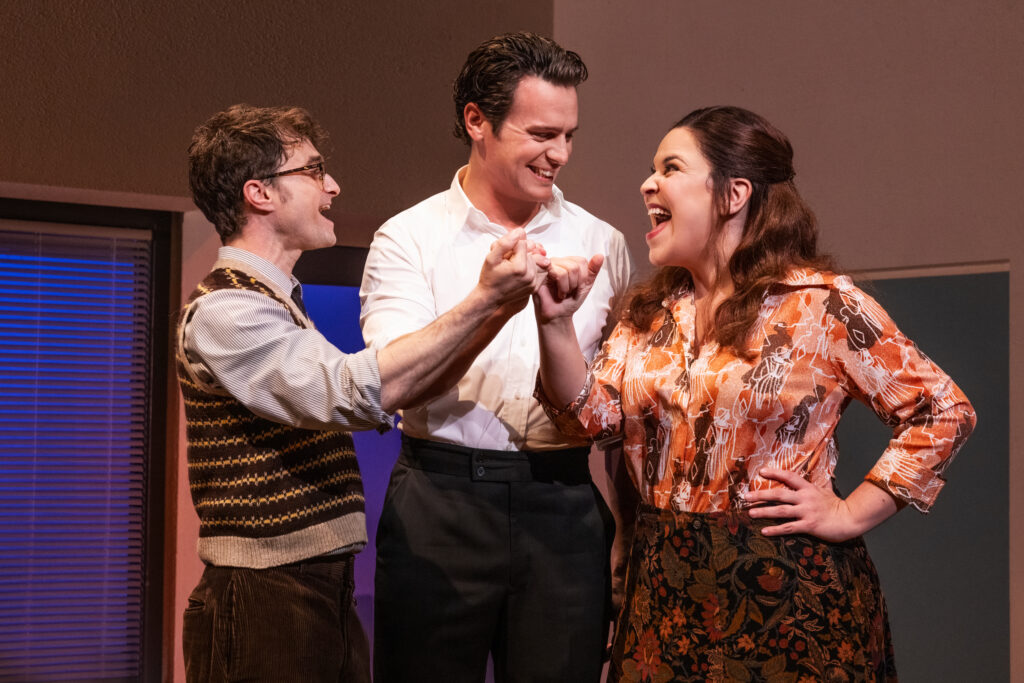 Daniel Radcliffe, Jonathan Groff, and Lindsay Mendez in Merrily We Roll Along. Photo by Matthew Murphy.