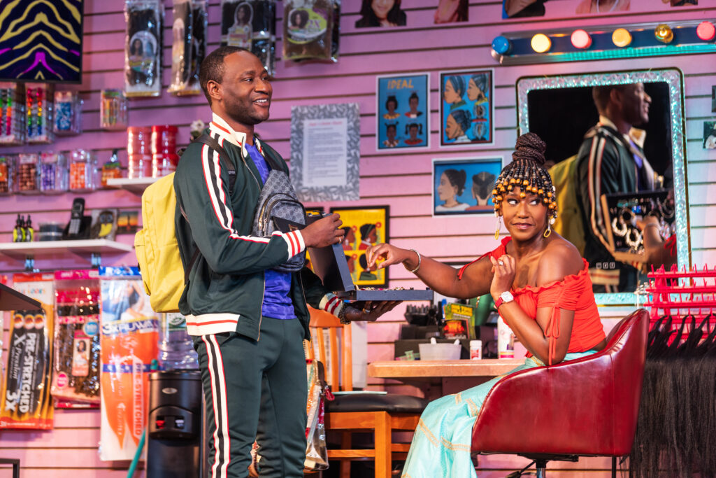 Michael Oloyede and Nana Mensah in Jaja’s African Hair Braiding. Photo by Matthew Murphy.