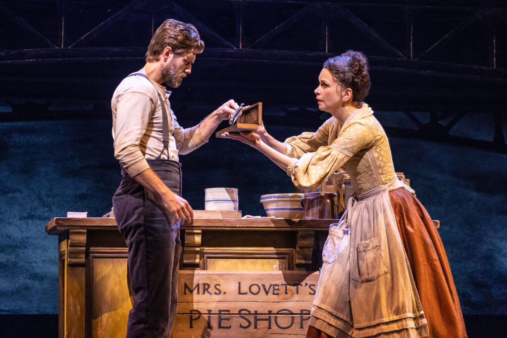 Aaron Tveit and Sutton Foster in Sweeney Todd. Photo by Matthew Murphy and Evan Zimmerman.