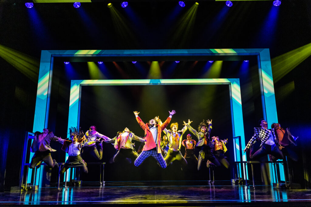 The company of <i>The Who's TOMMY</i>. Photo by Matthew Murphy and Evan Zimmerman.