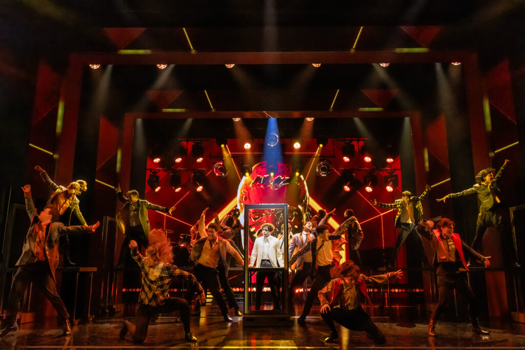 Ali Louis Bourzgui and the cast of <i>The Who's TOMMY</i>. Photo by Matthew Murphy and Evan Zimmerman. 