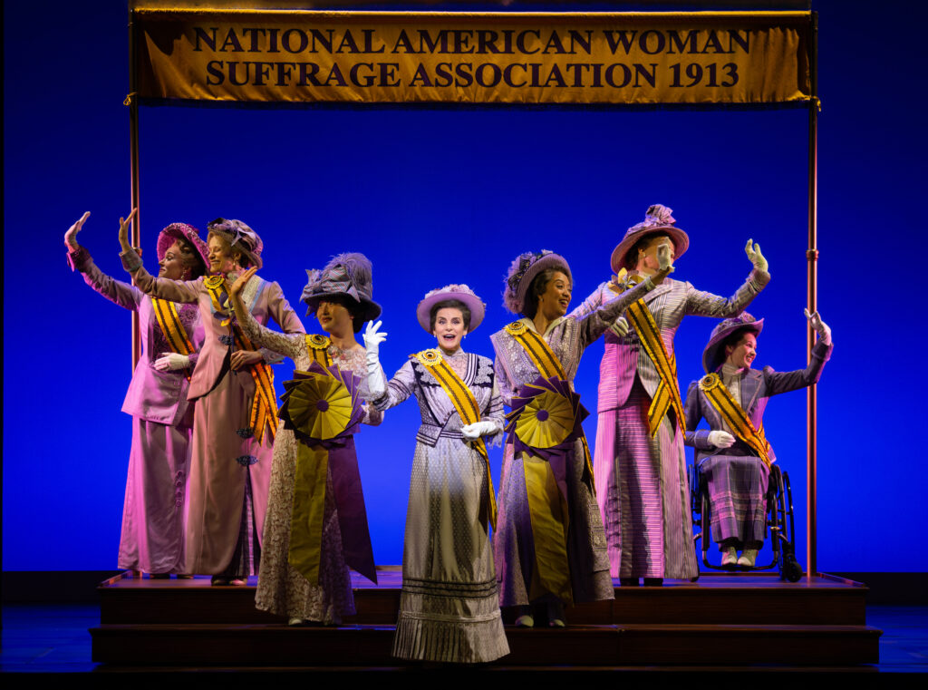 Jenn Colella as Carrie Chapman Catt and Suffs Company.