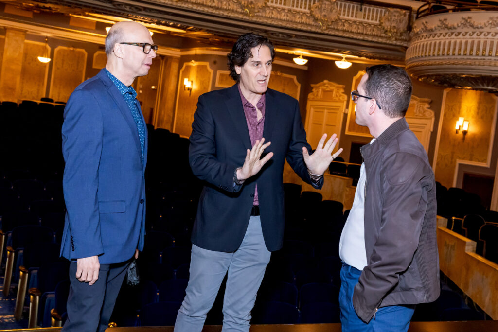 Nick Scandalios (center) with guests on stage at the Palace Theatre. Photo by Rebecca J Michelson for Broadway Direct.