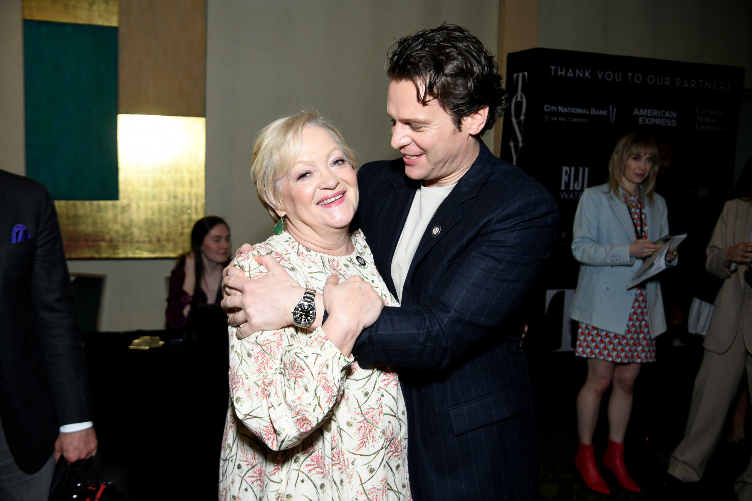 Maria Friedman with <i>Merrily We Roll Along</i> star Jonathan Groff at the 77th Annual Tony Awards Meet The Nominees Press Event. Photo by Jenny Anderson/Getty Images for Tony Awards Productions.