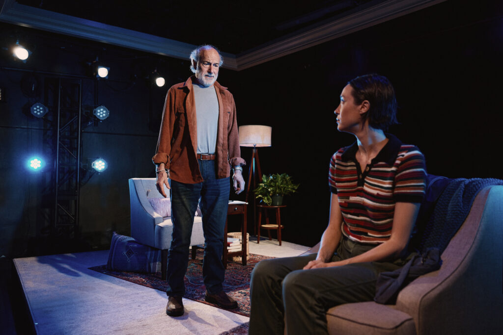 Peter Friedman and Sydney Lemmon in JOB at SoHo Playhouse. Photo by Emilio Madrid.