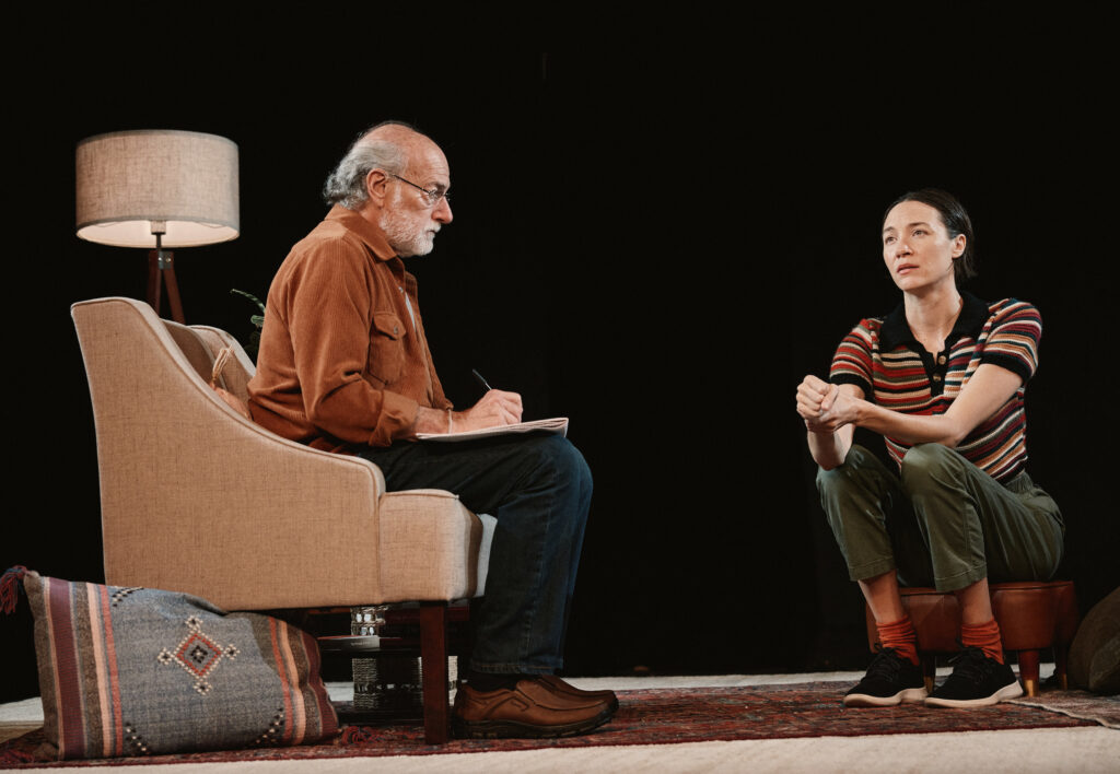 Peter Friedman and Sydney Lemmon in JOB at SoHo Playhouse. Photo by Emilio Madrid.