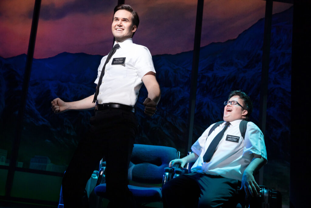 Kevin Clay as Elder Price and Cody Jamison Strand as Elder Cunningham in The Book of Mormon. Photo by Julieta Cervantes.