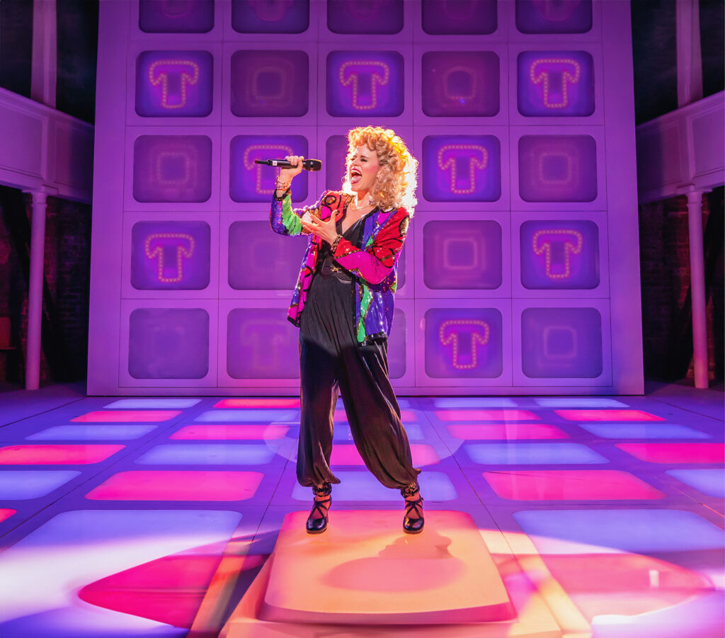 Katie Brayben in Tammy Faye. Photo by Marc Brenner.