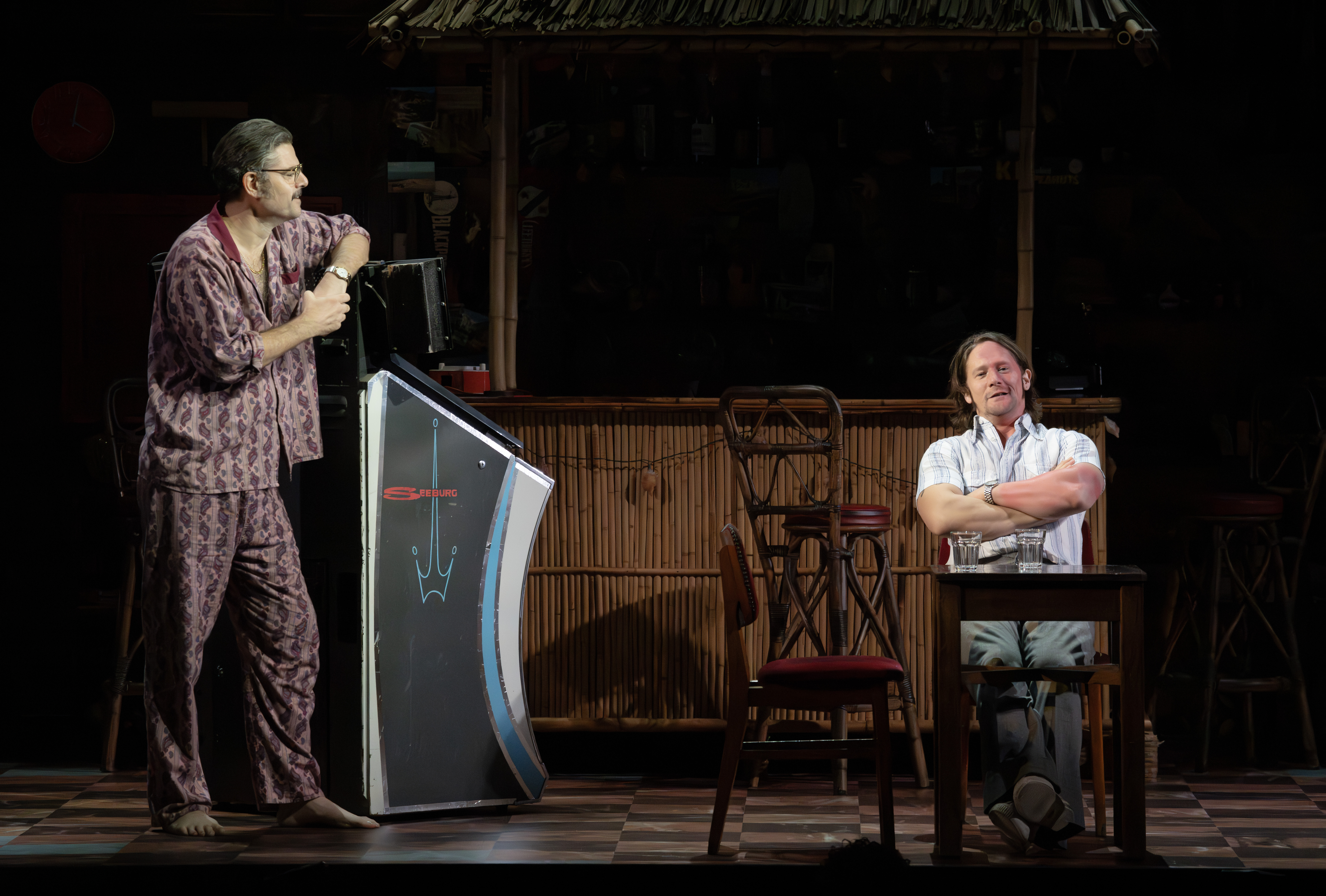 Two characters on stage together
