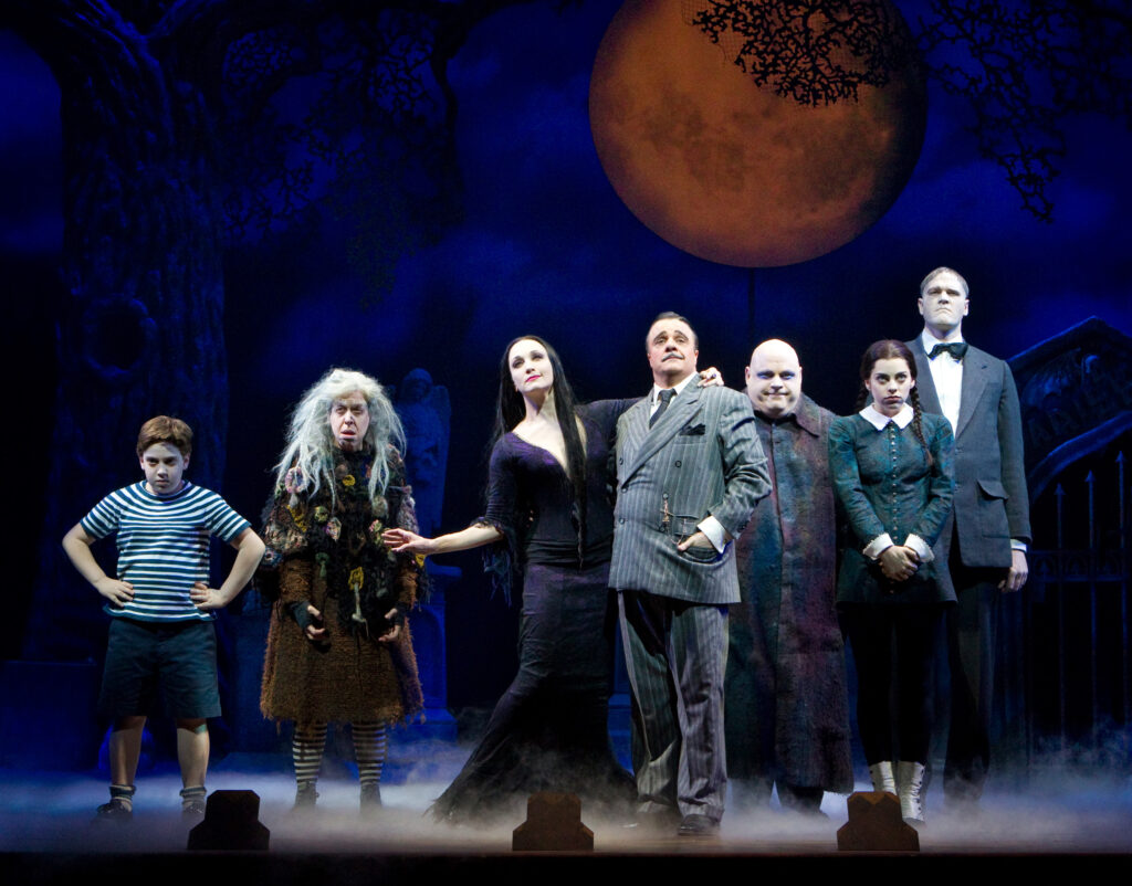Adam Riegler, Jackie Hoffman, Bebe Neuwirth, Nathan Lane, Kevin Chamberlin, Krysta Rodriguez and Zachary James in The Addams Family. Photo by Joan Marcus.