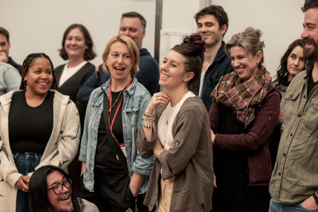 - Playwright Kate Trefry (center) with the company of Stranger Things: The First Shadow. Photo by Matthew Murphy.